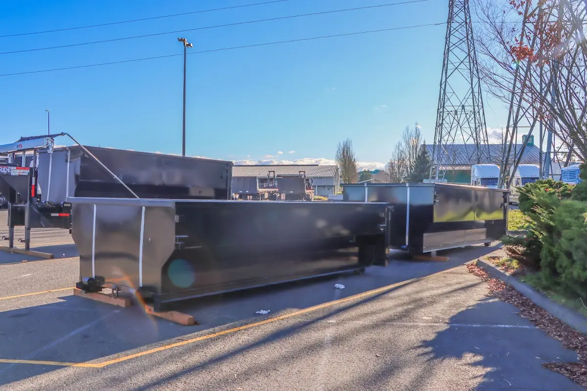 Roll-off dumpster ready for waste disposal at job site for 2 Yard Dumpster Rental in Archbald